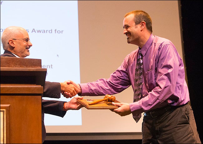 Pictured below at ECU's 2015 faculty convocation are past chair of the ECU faculty Andrew Morehead, right, and incoming chair John Stiller.