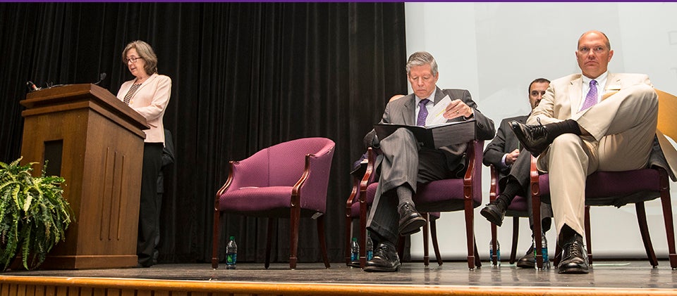 Pictured below, ECU biology professor Dr. Carol Goodwillie, 2015 winner of the UNC Board of Governors Award for Excellence in Teaching, speaks at the ECU Awards Day Ceremony. Seated are, left to right, Chancellor Steve Ballard, Faculty Chair Andrew Morehead and UNC Board of Governors representative Harry Smith.