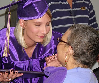 Brittney Massey left, shares a moment with her mother, Brenda Brown, following a special graduation ceremony Monday at Pitt County Memorial Hospital. Contributed photos.