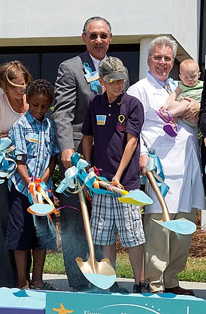 Dr. Paul Cunningham, center, and Dr. David Rodeberg, right, participate in the groundbreaking for the new Children's Hospital. Photo by Cliff Hollis