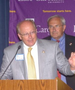 N.C. Rep. Mitch Gillespie of Marion speaks Tuesday, Aug. 2, in Spruce Pine as N.C. Rep. Ray Rapp of Mars Hill listens.