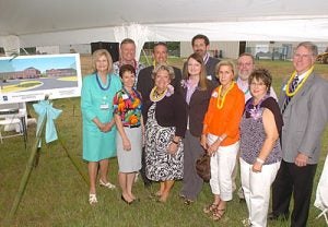 Dr. Phyllis Horns, left, poses with faculty, staff and family members of the ECU School of Dental Medicine at Tuesday's ground-breaking in Ahoskie. Dr. Phyllis Horns, left, poses with faculty, staff and family members of the ECU School of Dental Medicine at Tuesday's ground-breaking in Ahoskie. They are, from left, Horns, Dr. Geri Crain, Dr. Michael L. Scholtz, Dr. Frank Serio, Dr. Margaret Wilson, Kristen Ward, Ken Tomlinson, Knox Chadwick, Guy Wilson, Peggy Tomlinson and Dr. Greg Chadwick.