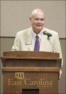 Bob Lucas of Selma, installed July 21 as chair of the ECU Board of Trustees, speaks during the meeting.