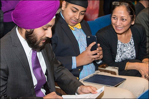 Puneet Singh opens his letter with family during Match Day at ECU.