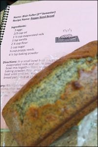 A poppyseed bread recipe from the nursing student association cookbook, along with a sample of the bread, is shown above.