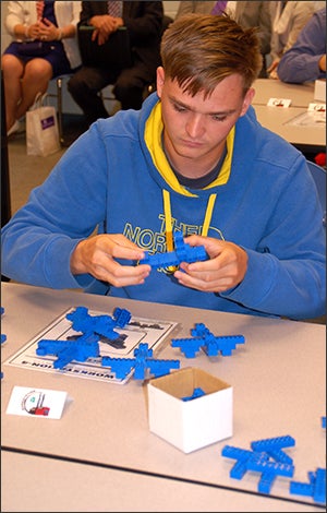 TAMV supports eastern North Carolina manufacturers by providing a skilled workforce. Pictured above, Nathaniel Garland completes the workstation simulation.