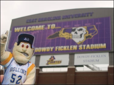 Rollins College mascot Tommy Tar visits Dowdy-Ficklen Stadium at ECU during a whirlwind tour of eastern North Carolina that included stops in Bath, Fort Fisher, the Wilmington EUE/Screen Gems film television studio, the USS North Carolina Battleship, the N.C. Estuarium, the Big Rock Blue Marlin Tournament in Morehead City, the Old Baldy lighthouse on Bald Head Island, Beaufort, the Greenville Town Common and a Pitt County tobacco farm. (Photo courtesy of the ECU Flat Stanley project)