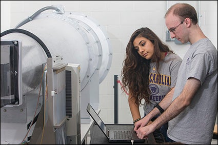 Working with objects in the wind tunnel helps students understand more clearly some of the concepts they are learning in the classroom, according to ECU assistant professor Dr. Eban Bean.