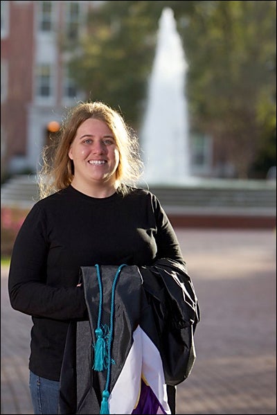 ECU graduate Jill Allender overcame tremendous odds to survive a near-fatal traffic accident that initially left her completely paralyzed. On Dec. 16, she will walk with classmates to accept her diploma during commencement ceremonies. (Photo by Cliff Hollis)