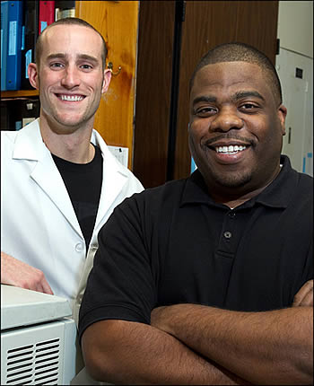 William Chappell, left, and Ossie Dyson completed their doctorates in microbiology and immunology this fall at the Brody School of Medicine at ECU. Photo by Cliff Hollis