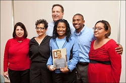 Left to right, Barbara Kalinowski, wife of donor recipient Joseph Kalinowski, Darlene Williams, Joseph Kalinowski, Lynette Collins (holding photo of donor Timur Saltuklaroglu), James Collins, and Stephanie Richardson pose for a group photo Thursday. Photos by Cliff Hollis.