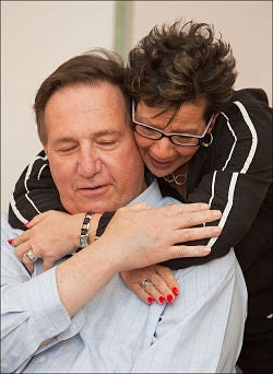 Joseph Kalinowski is hugged by Darlene Williams. He received her kidney.