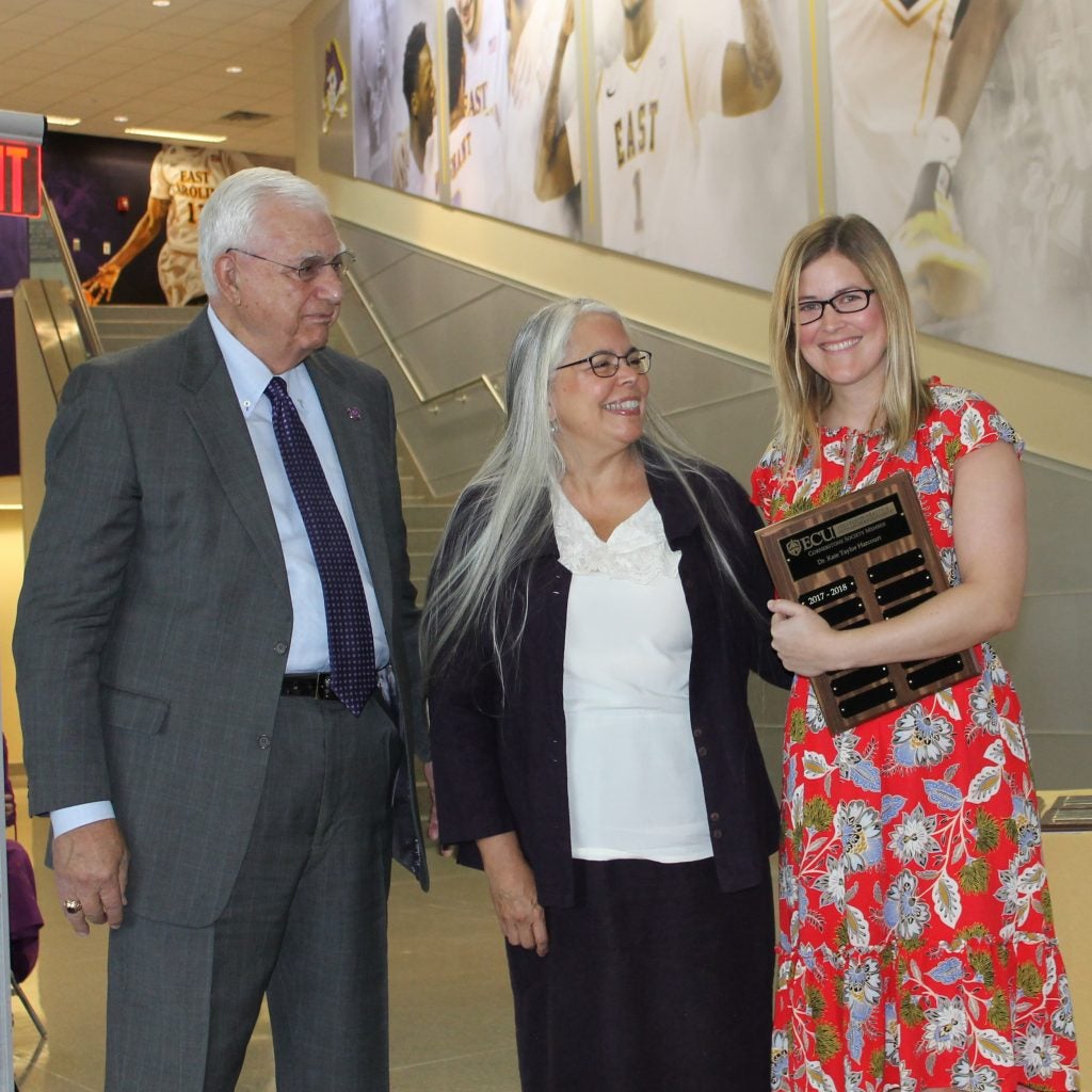 At right, Kate Taylor Harcourt, assistant professor of human development and family science, was inducted in the Cornerstone Society, which recognizes donors who provide gifts of $1,000 or more.