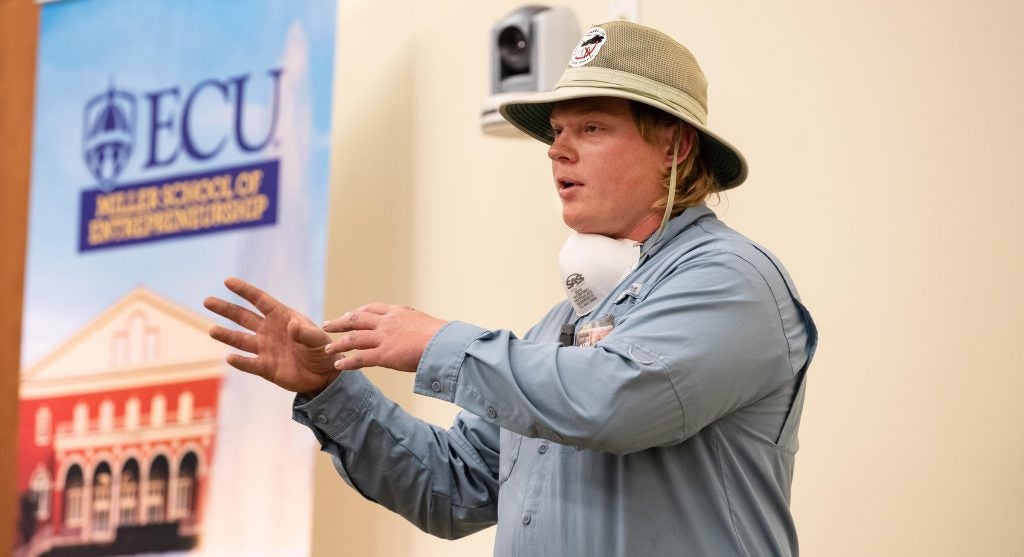 Hunter Graves responds to a question from judges during the second round of the Pirate Entrepreneurship Challenge. Graves' business venture, InvisiBarrier Mosquito Control, was selected to move to the third round of competition. 