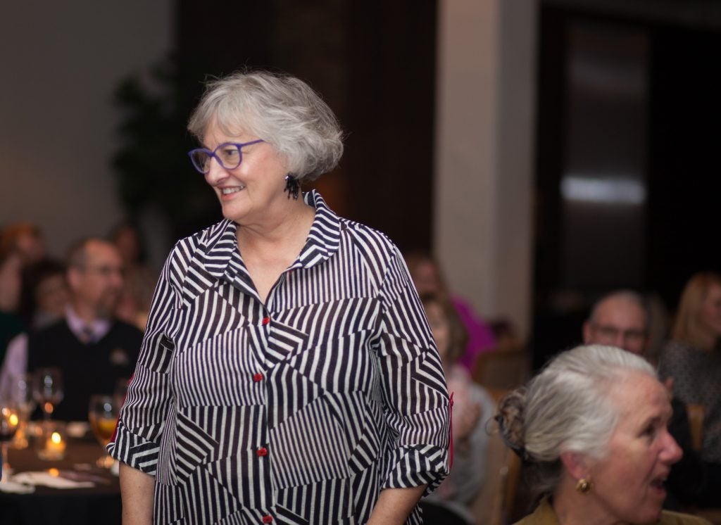 Dr. Marie Pokorny and other members of the Friends of Laupus Library stand to be recognized for their sponsorship and ongoing support of the author event and other library programs.