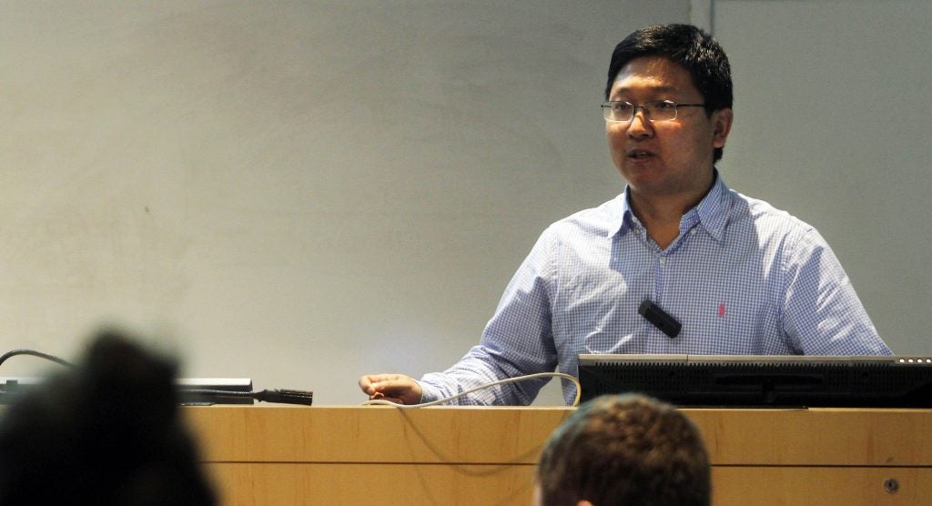 Dr. Yang Liu talks about his research during a lightning talk event at the Science and Technology Building.