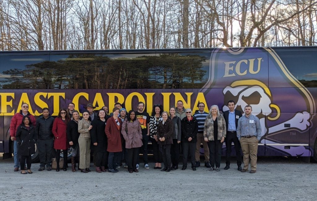 Approximately 25 conference attendees took a bus trip Friday, Feb. 28, to Windsor and Princeville, two towns that have sustained significant flood damage due to hurricanes. (Contributed photo)