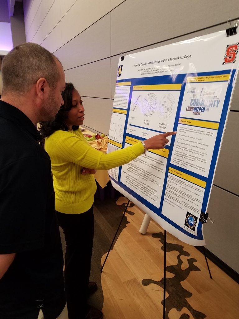 Tobin Walton and Lauren Davis of N.C. A&T State University discuss their research Friday, Feb. 28, at ECU’s 2020 HurriCon.