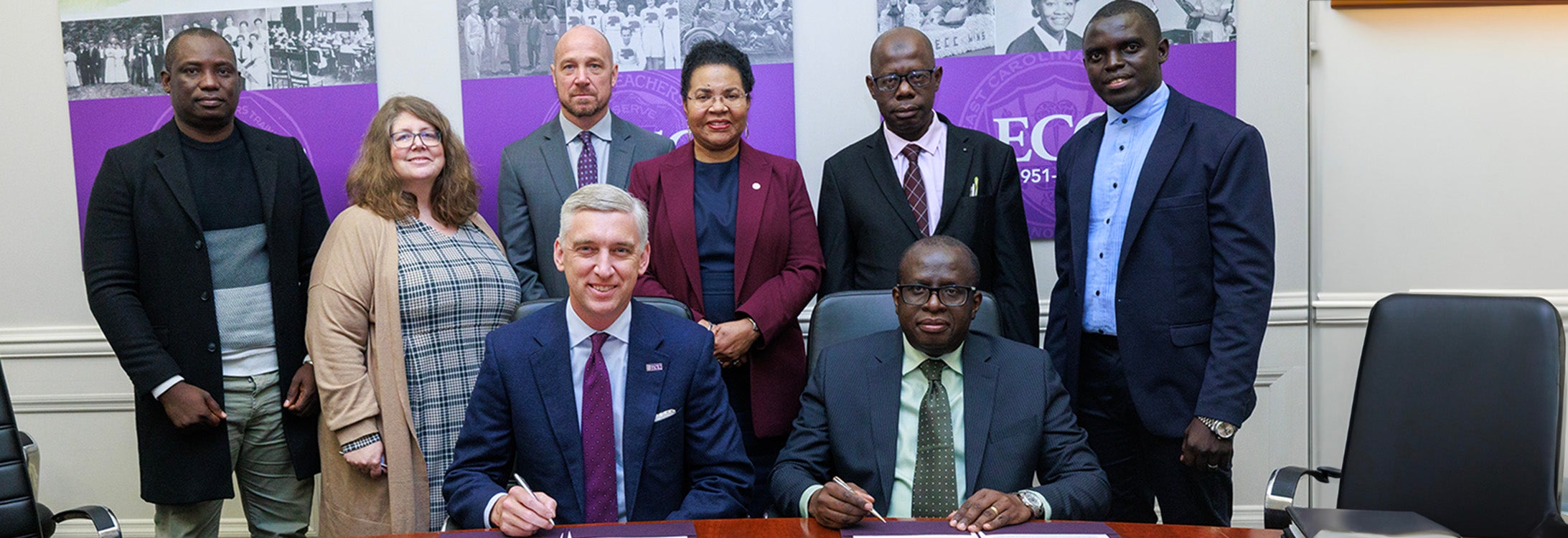 Leaders from East Carolina University and the University of The Gambia signed a memorandum of understanding on March 28. (ECU photo by Steven Mantilla)