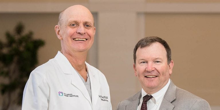 From left, Dr. Paul Mounsey, ECU's new chief of cardiac electrophysiology and ECU cardiac surgeon Dr. Andy Kiser are part of the new atrial fibrillation management team at ECHI.