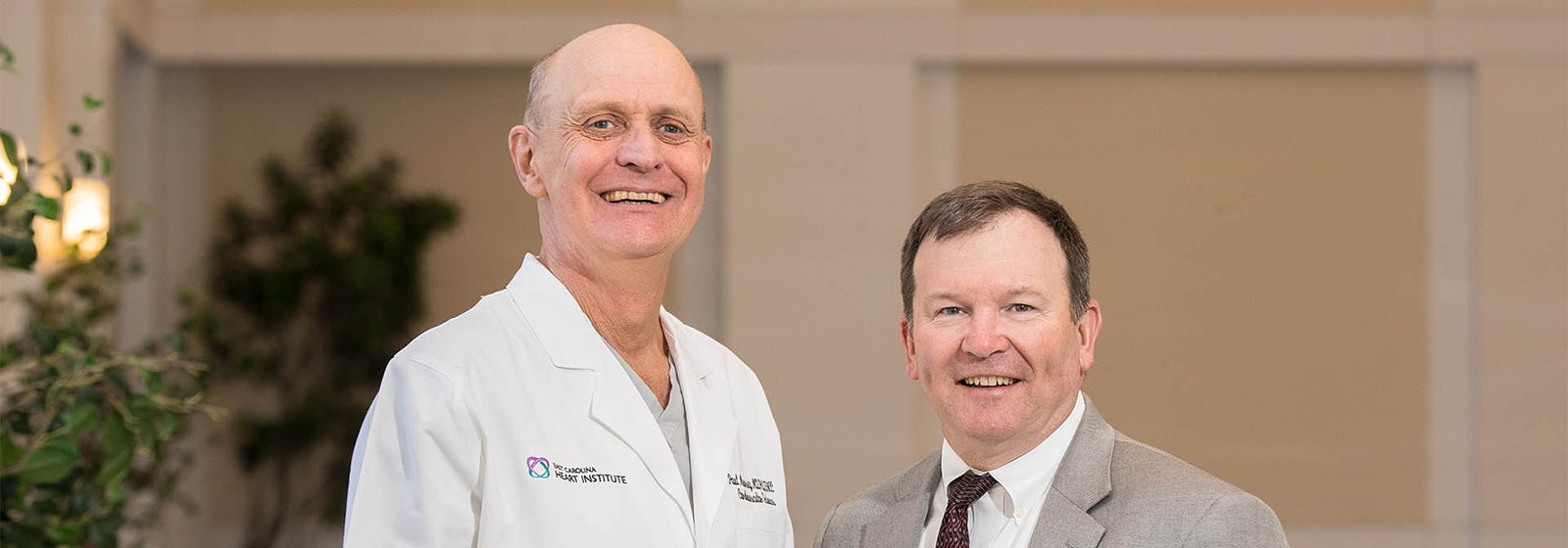 From left, Dr. Paul Mounsey, ECU's new chief of cardiac electrophysiology and ECU cardiac surgeon Dr. Andy Kiser are part of the new atrial fibrillation management team at ECHI.