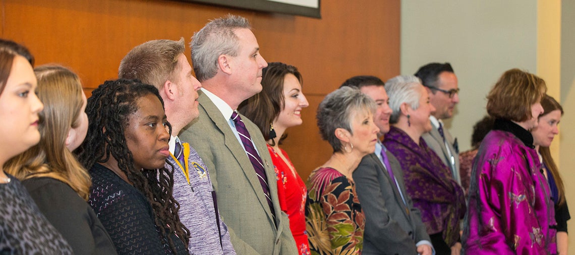 Employees and students are recognized as inductees to ECU’s Servire Society.