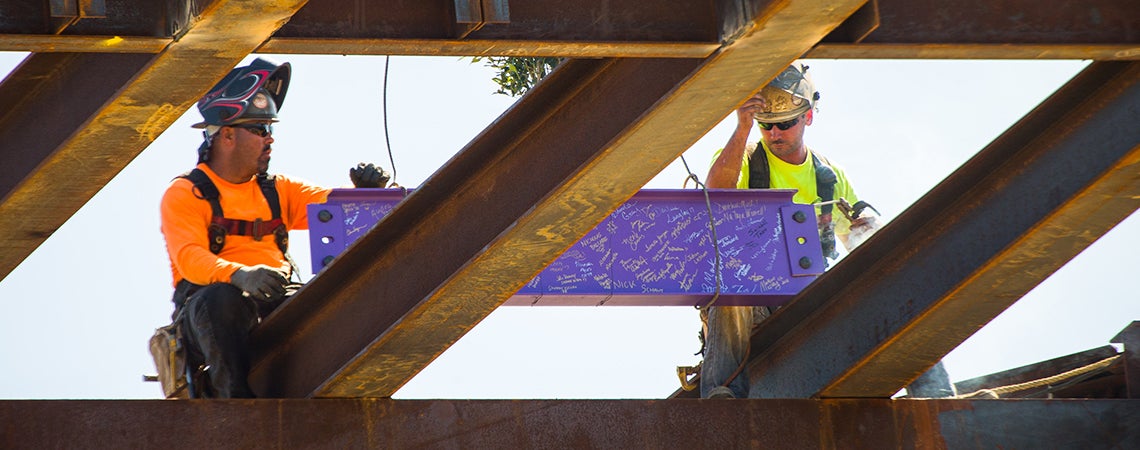 The beam signed in the topping off ceremony on Oct. 4 is placed at the top of the new ECU Student Center.