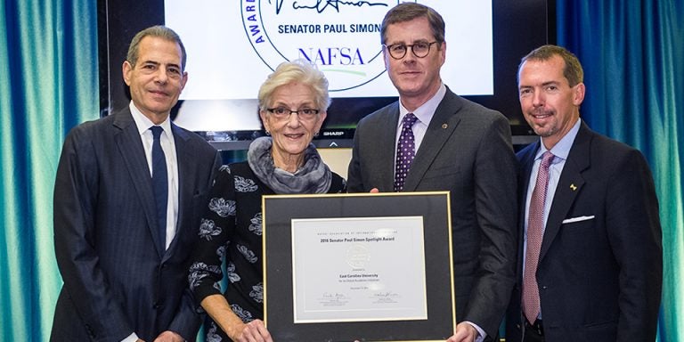 Chancellor Cecil Staton accepts the Senator Paul Simon Award during the NAFSA Presidential Panel and Awards Reception Nov. 15 in Washington, D.C. From left to right, Richard Stengel, Under Secretary of State for Public Diplomacy and Public Affairs, looks on as Marlene Johnson, NAFSA executive director and CEO presents the award to Dr. Staton. Also photographed is Martin Simon, son of the late Senator Paul Simon, right. (Photos courtesy of NAFSA)