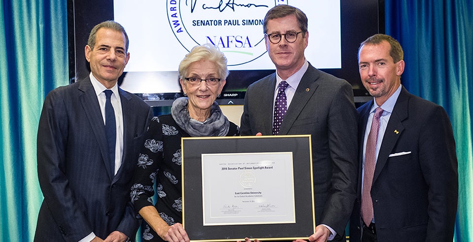 Chancellor Cecil Staton accepts the Senator Paul Simon Award during the NAFSA Presidential Panel and Awards Reception Nov. 15 in Washington, D.C. From left to right, Richard Stengel, Under Secretary of State for Public Diplomacy and Public Affairs, looks on as Marlene Johnson, NAFSA executive director and CEO presents the award to Dr. Staton. Also photographed is Martin Simon, son of the late Senator Paul Simon, right. (Photos courtesy of NAFSA)