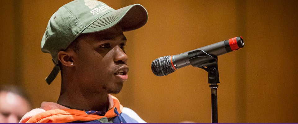 ECU sophomore Emmett Sarkorh asks a question during the Brewster Forum, part of the Voyages of Discovery Lecture Series, on Jan. 26. Attendees explored the challenge of reconciling history with contemporary realities in the naming of memorials. (Photos by Jay Clark)