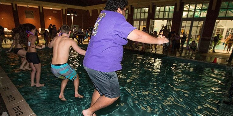 More than 1,100 participants braved the icy waters of the outdoor pool for the annual ECU Polar Bear Plunge last year. Organizers are hoping to break records once again during the 20th anniversary of the event on Jan. 21.