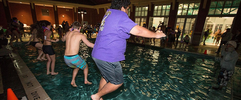 More than 1,100 participants braved the icy waters of the outdoor pool for the annual ECU Polar Bear Plunge last year. Organizers are hoping to break records once again during the 20th anniversary of the event on Jan. 21.