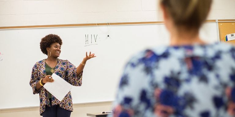 Jaye Holland leads a class exercise during a Teach Back session of the Family Life Institute at ECU. (Photos by Cliff Hollis)