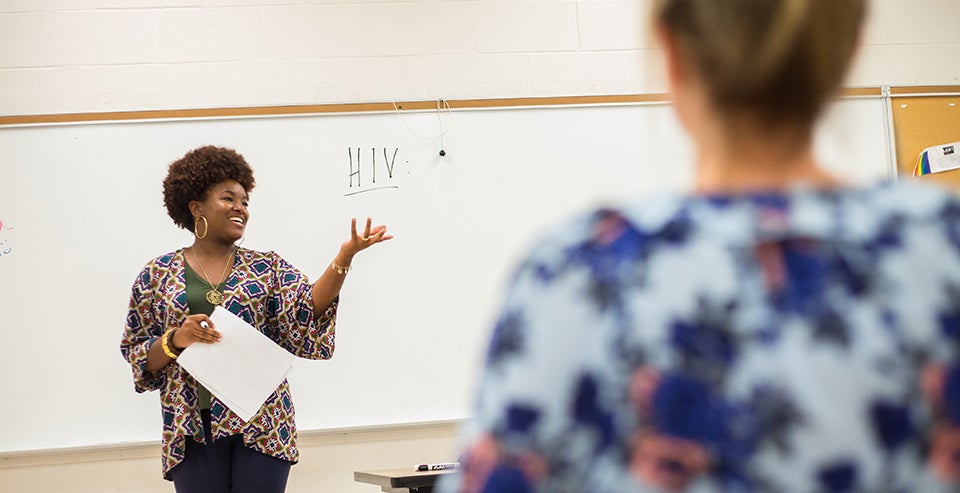 Jaye Holland leads a class exercise during a Teach Back session of the Family Life Institute at ECU. (Photos by Cliff Hollis)