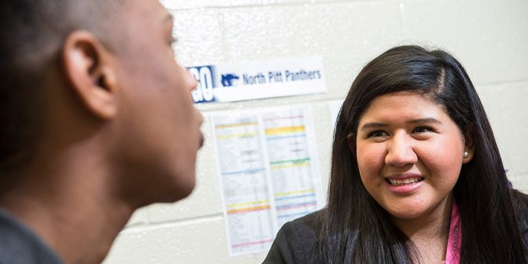 ECU counselor education student, Aleida Velasquez, works with at-risk populations at North Pitt High School in Pitt County. (Photos by Cliff Hollis)
