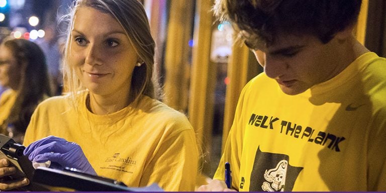 ECU students Macie Whitlow and Garrett VanHoy are among a group of student researchers assisting health and human performance professor Beth Chaney in her research on alcohol consumption and hazardous drinking behaviors. (Photos by Cliff Hollis)