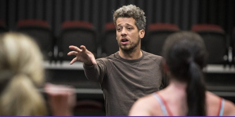 Koresh dancer and ECU alumnus Micah Geyer prepares ECU students for their rehearsal for 