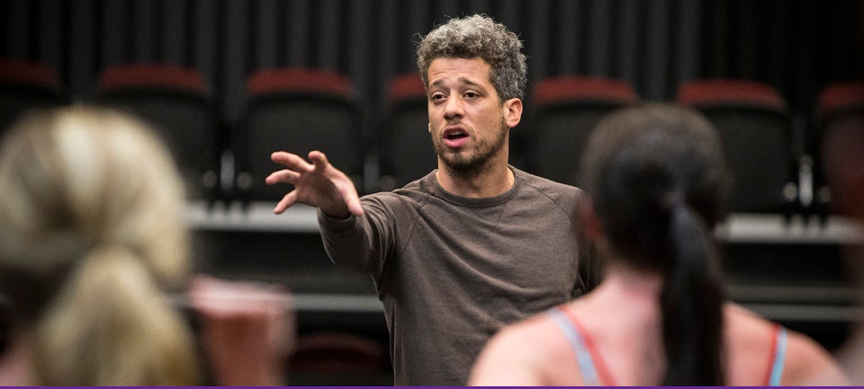 Koresh dancer and ECU alumnus Micah Geyer prepares ECU students for their rehearsal for 