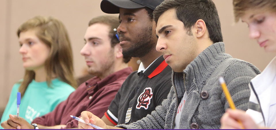 ECU students listen carefully to discussion of preparedness efforts during a panel discussion of Ebola and campus readiness. (Photos by Cliff Hollis)