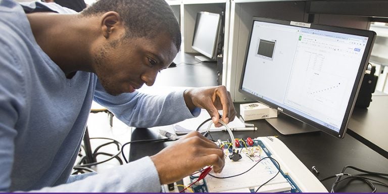 ECU senior Coriyon Arrington works in a biomedical instrumentation lab in the engineering department at East Carolina University. Created in response to regional industry needs for a skilled workforce, the department celebrates 10 years on Oct. 3. (Photo by Cliff Hollis)