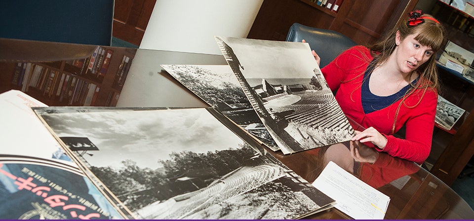 Ashley Williams, project librarian at ECU's Joyner Library, displays some of the materials being catalogued from hundreds of outdoor theaters for an online inventory. (Photos by Cliff Hollis)