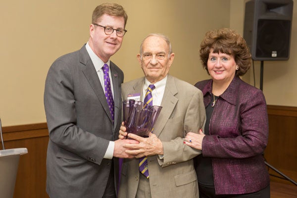 Chancellor Cecil Staton and his wife, Catherine, award the Amethyst to Max Ray Joyner Sr.