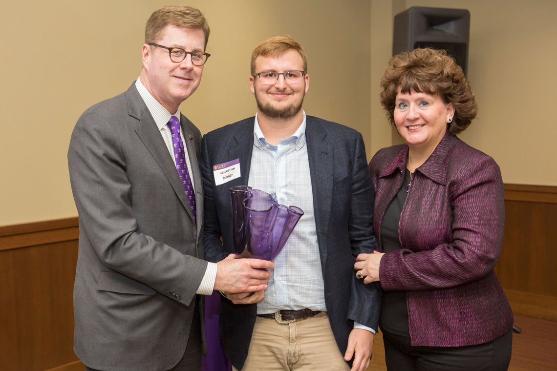 Chancellor Cecil Staton and his wife, Catherine, award the Amethyst to Sebastian Turner, representing The Oak Foundation.