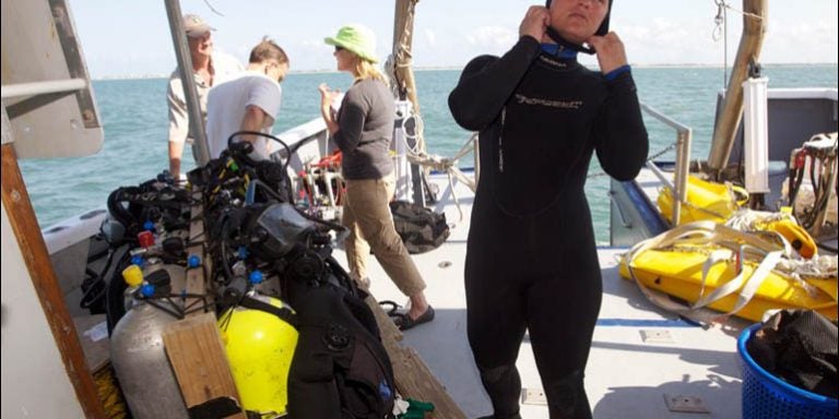 Researchers have recovered an anchor from a shipwreck believed to be that of pirate Blackbeard's flagship, the Queen Anne's Revenge. Photos from the recovery of the artifact show the crew on the R/V Dan Moore working to bring an anchor onboard the research vessel from Cape Fear Community College in the waters near Beaufort Inlet. Divers used lift bags to slowly raise the anchor, which was then prepared for a move to the QAR Conservation Lab at ECU. (Photos and video by Cliff Hollis)