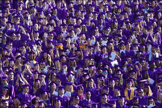 Friends and family cheered as ECU graduates received their degrees at East Carolina University's annual spring commencement, May 6. Commencement speaker Ray Mabus, U.S. Secretary of the Navy, urged graduates to do something bigger than themselves by undertaking service to their schools, their communities, their nation or their world. (Photos by Cliff Hollis)