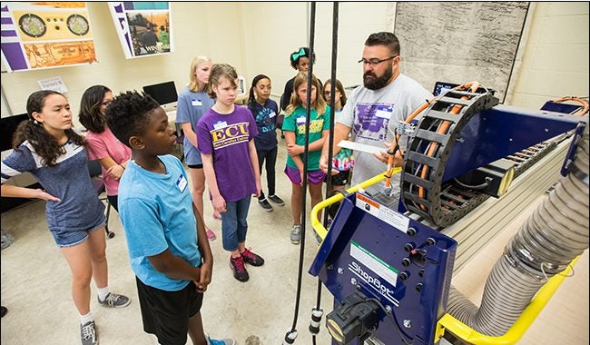 Campers at East Carolina University's STEM to STEAM camp enjoy hands-on activities that help them learn concepts in art, science, technology, engineering and math. (Photos by Cliff Hollis)