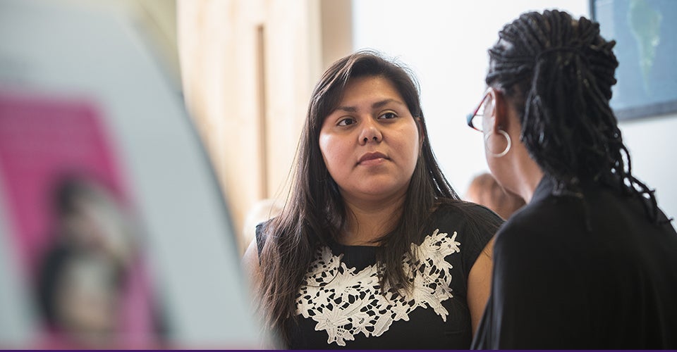 Mira Sanchez, left, and Carla Lee attended ECU training to learn how to serve as community breast health educators, thanks to $125,000 in grants from the Susan G. Komen North Carolina Triangle to the Coast Affiliate. (Photos by Cliff Hollis)