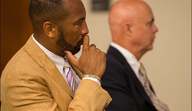 ECU Board of Trustees members Danny Scott, left, and Edwin Clark listen to discussion during the July 17 board meeting. At that meeting, ECU Provost Ron Mitchelson presented the plan for reorganization for ECU's College of Human Ecology. (Photo by Cliff Hollis)