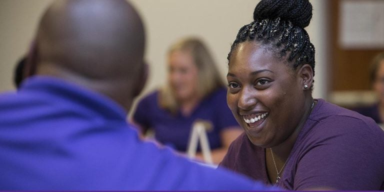 Kathryn Cobb, administrative support associate in ECU admissions, interacts with a fellow workshop participant at the ECU Speech Communication Center, which helps individuals enhance their speaking and presentation skills. (Photos by Cliff Hollis)