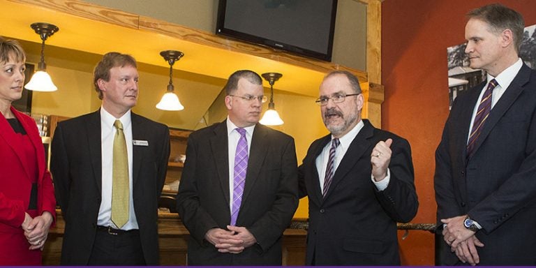 Pictured at the announcement of a Golden LEAF Foundation grant that will enable ECU to prepare students to work in the pharmaceutical industry are, left to right, Dr. Maria Pharr, N.C. Community College Executive BioNetwork director; Dr. Thomas Gould, vice president of Academic Affairs at Pitt Community College; Dan Gerlach, president of the Golden LEAF Foundation; ECU Provost Dr. Ron Mitchelson; and ECU Associate Vice Chancellor Dr. Ted Morris. (Photos by Cliff Hollis)